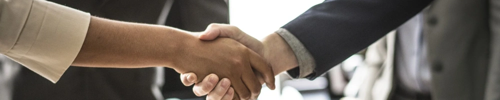 Image of people shaking hands